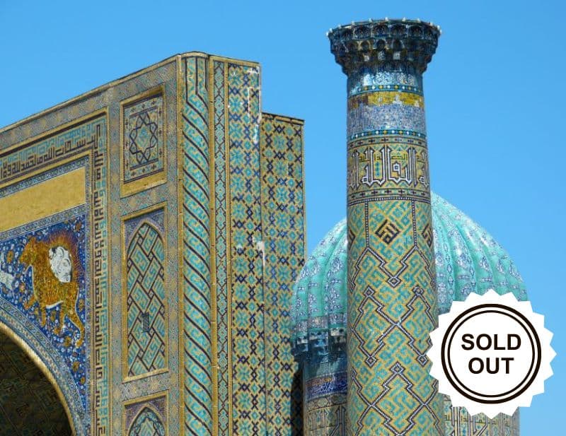 blue and turquoise tiled building in Uzbekistan